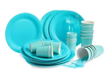 Set of disposable tableware on white background