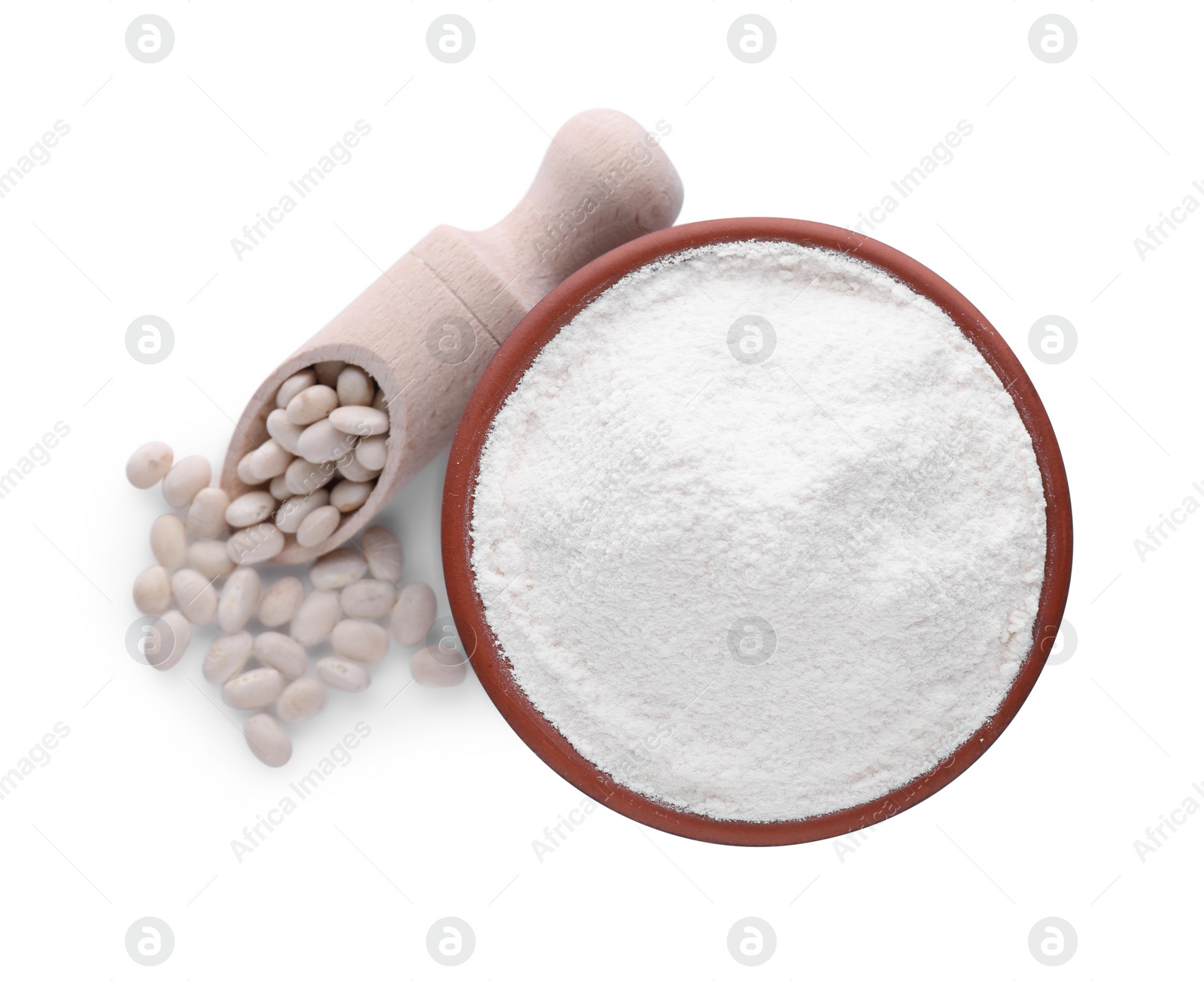 Photo of Bowl with flour, wooden scoop and kidney beans isolated on white, top view