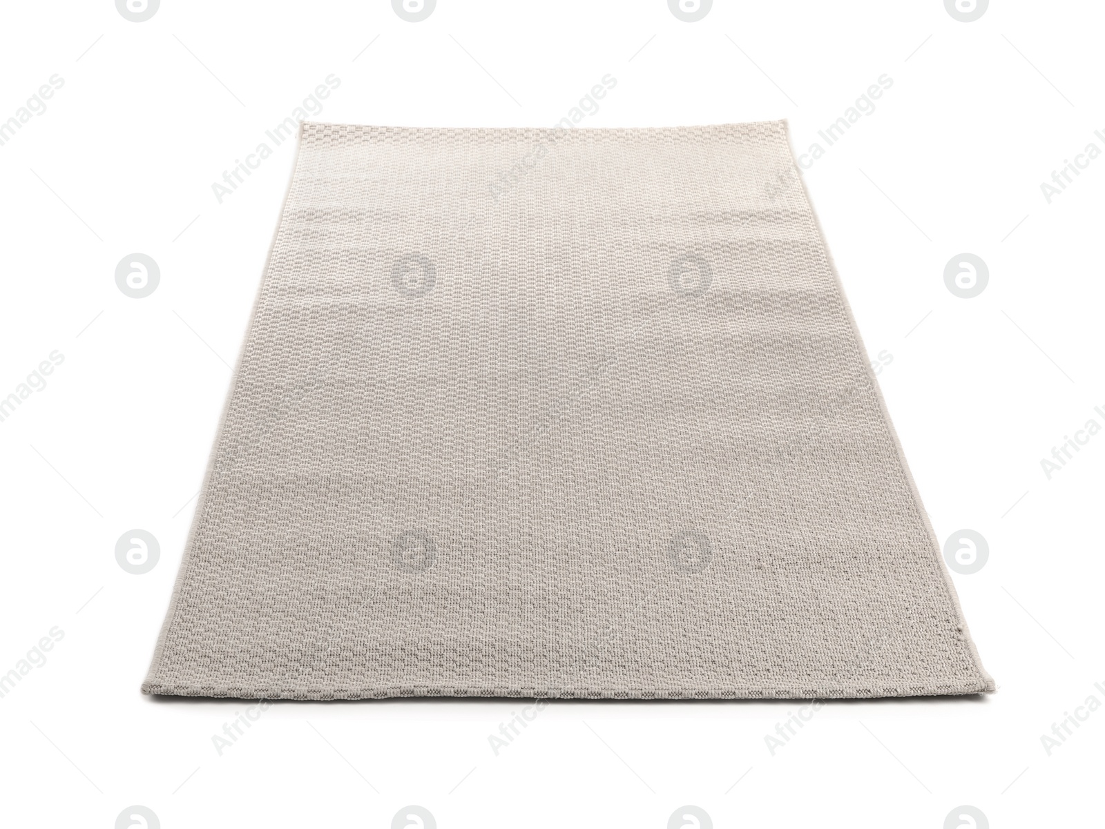 Photo of Grey carpet on white background. Interior element