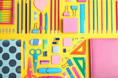 Photo of Flat lay composition with different school stationery on color background