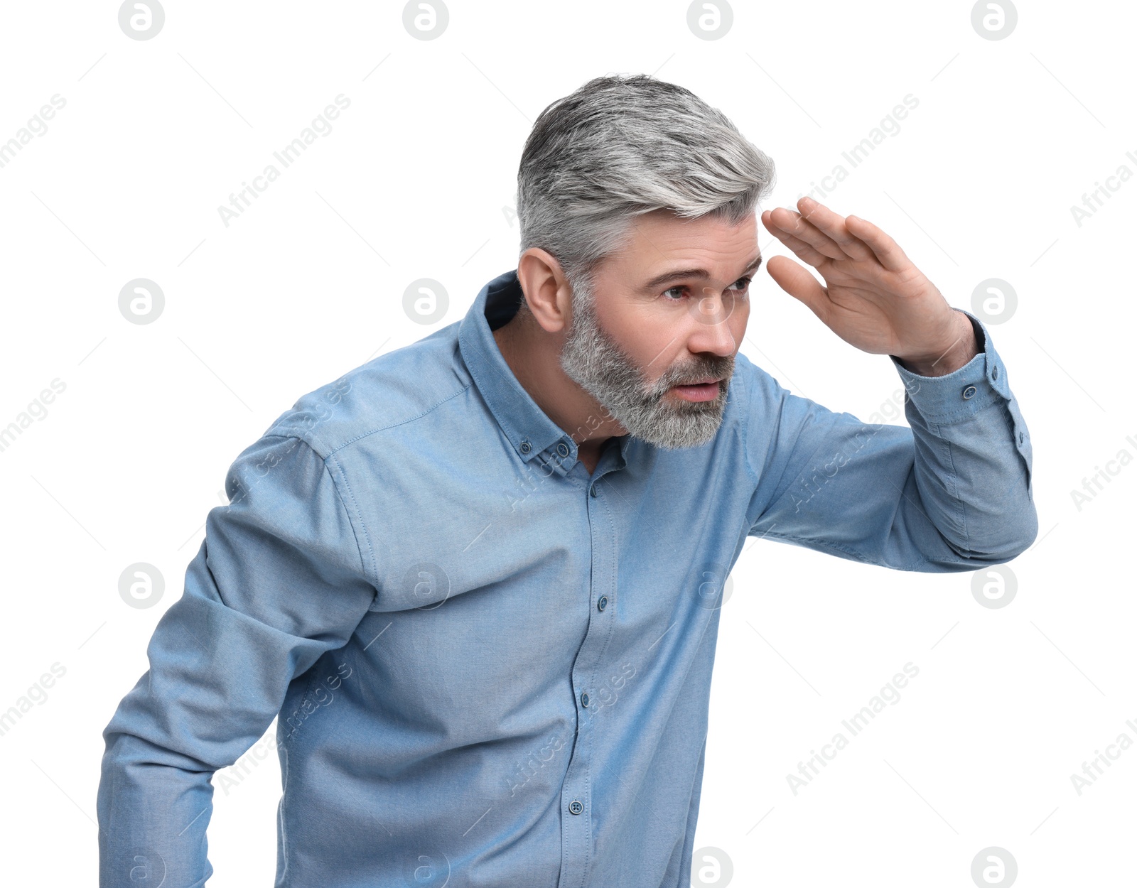 Photo of Mature businessman in stylish clothes posing on white background