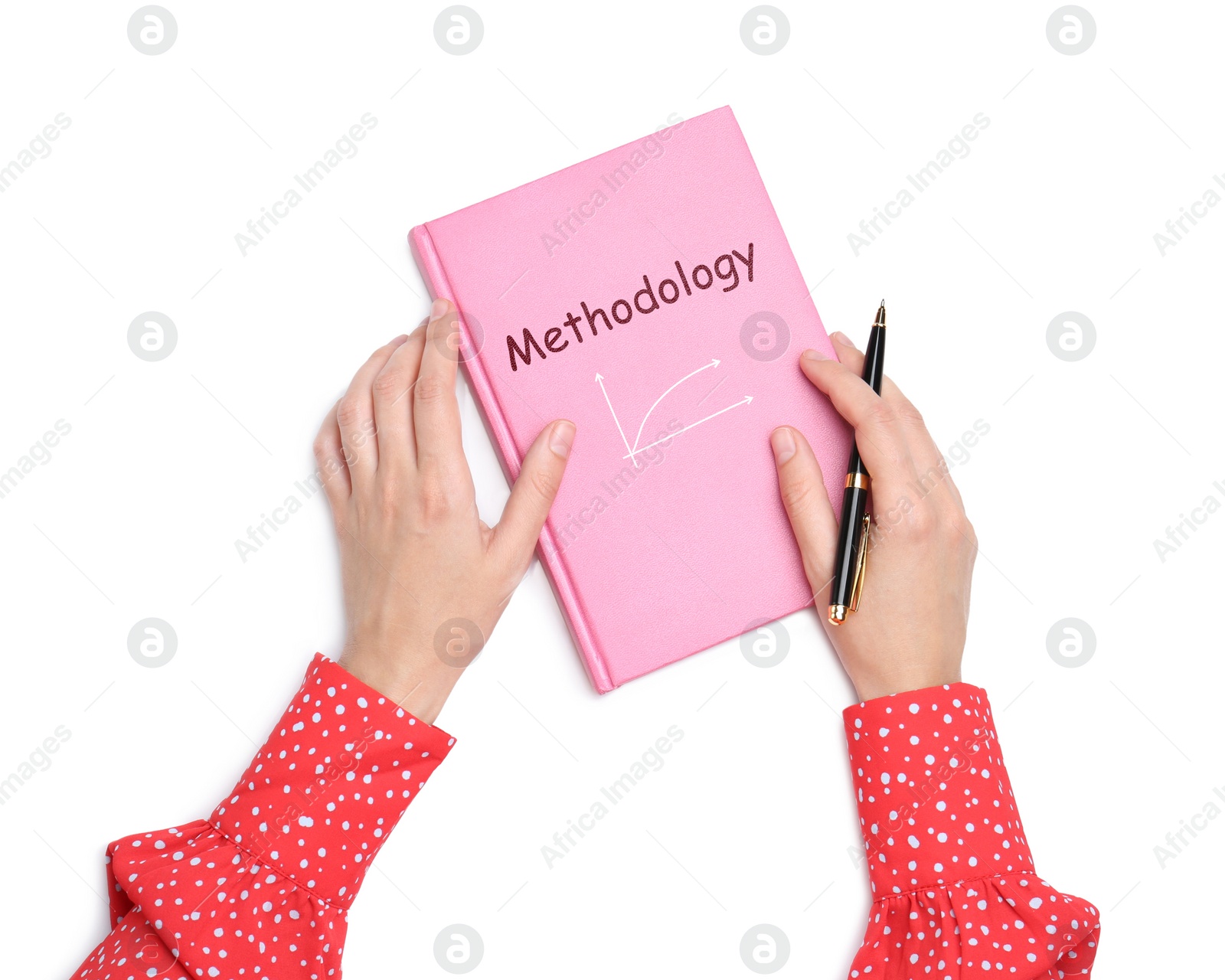 Image of Woman holding notebook with word Methodology and chart on white background, top view