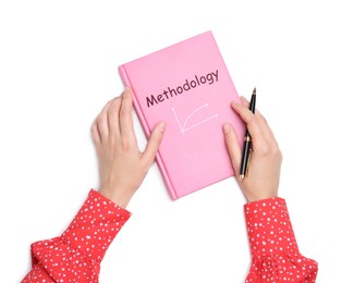 Image of Woman holding notebook with word Methodology and chart on white background, top view
