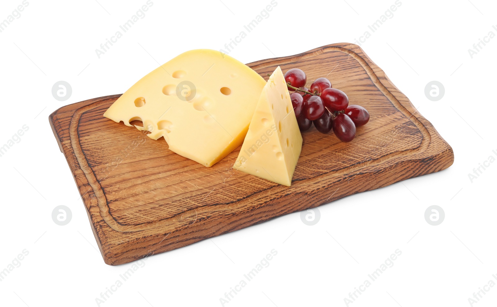 Photo of Pieces of delicious cheese and grapes isolated on white