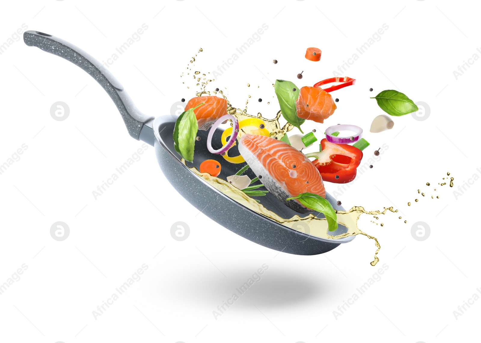 Image of Tasty fresh ingredients and frying pan on white background