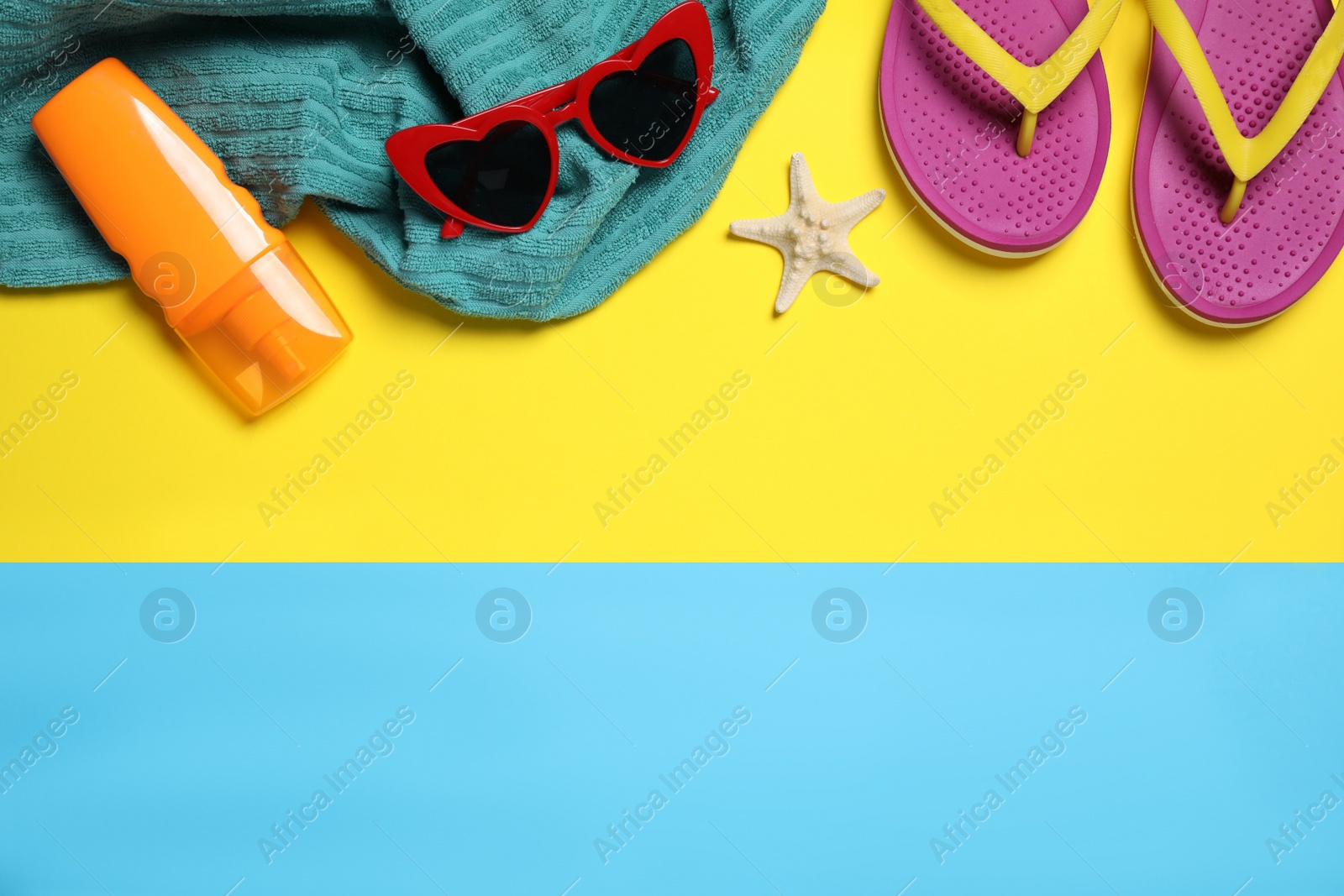 Photo of Flat lay composition with beach accessories on color background. Space for text