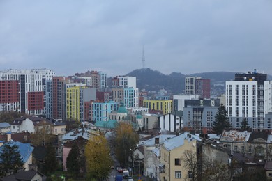 City with many different buildings under beautiful sky