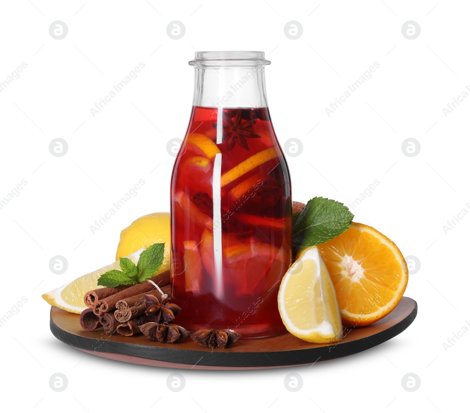 Photo of Bottle with tasty punch drink and ingredients isolated on white