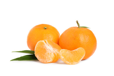 Photo of Fresh juicy tangerines with green leaves isolated on white