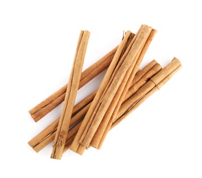 Photo of Aromatic dry cinnamon sticks on white background, top view