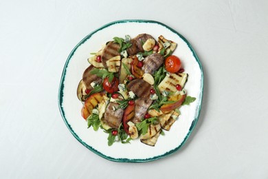 Photo of Delicious salad with beef tongue, grilled vegetables, peach and blue cheese on white table, top view