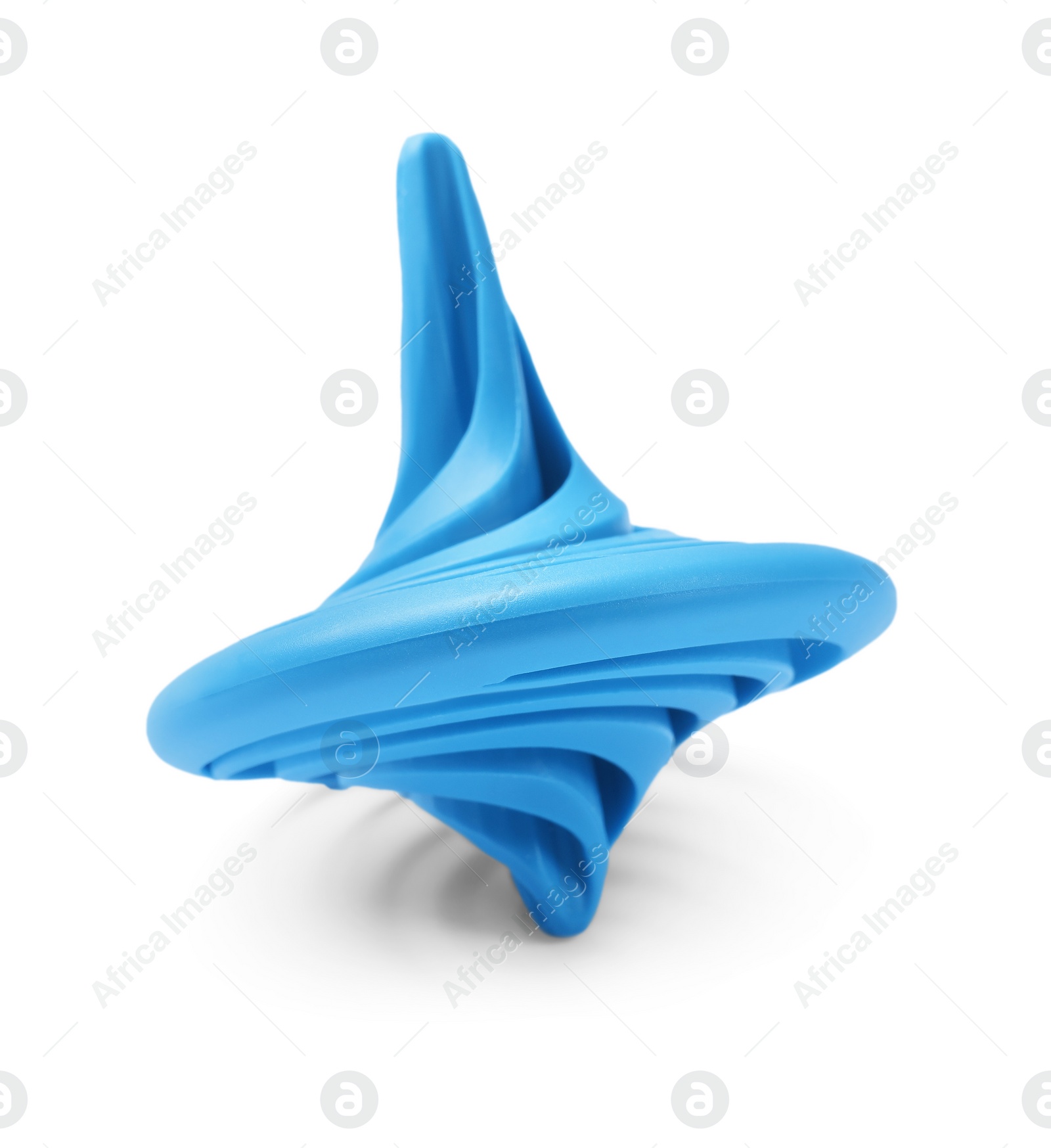 Photo of One blue spinning top isolated on white
