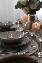 Photo of Festive table setting with beautiful floral decor in restaurant