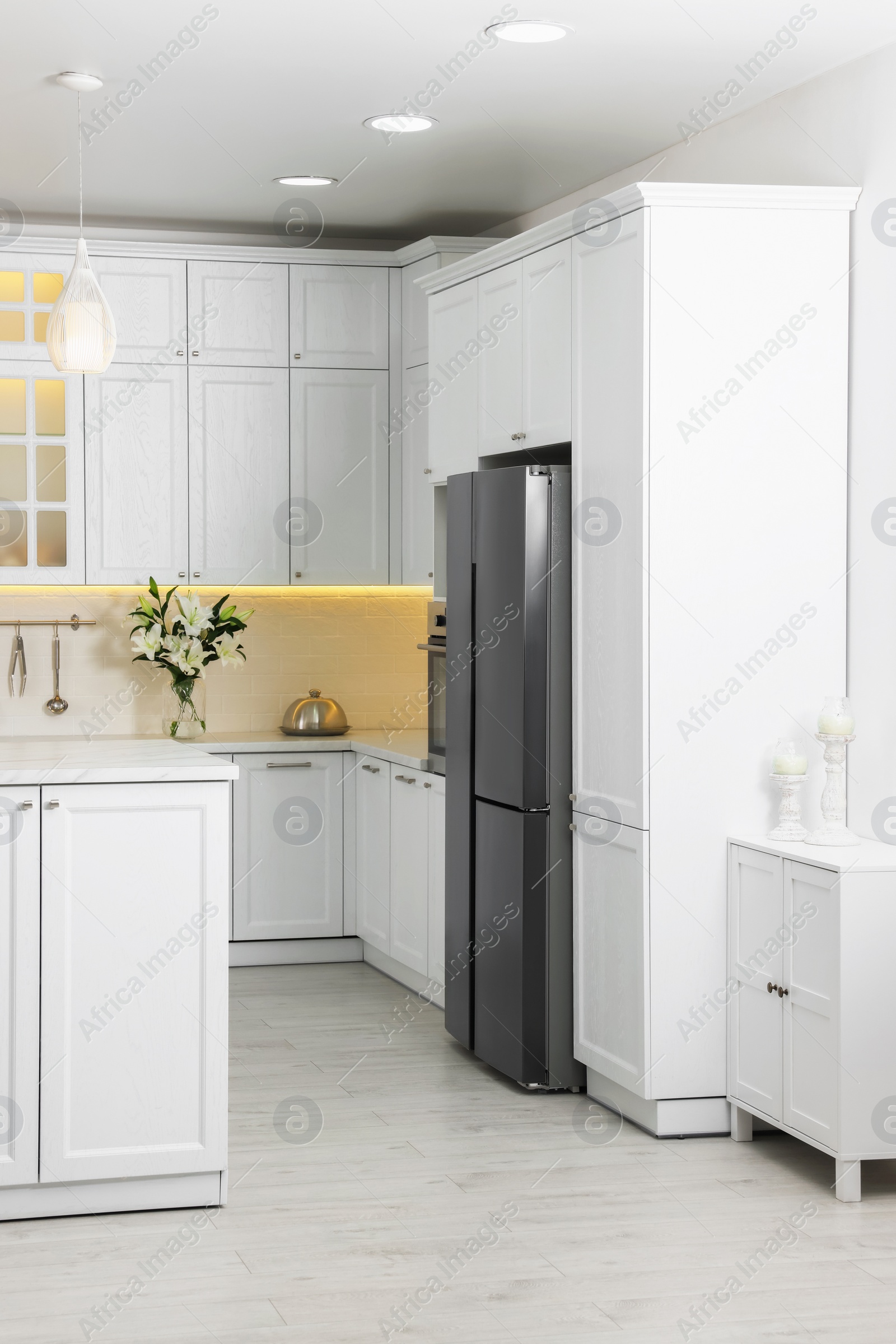 Photo of Luxury kitchen interior with new stylish furniture