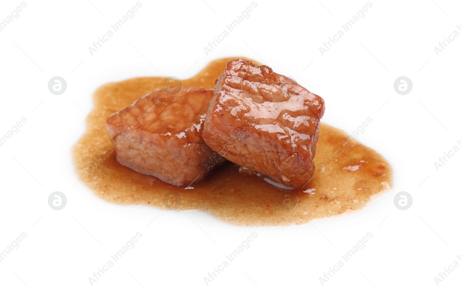 Photo of Pieces of delicious cooked beef isolated on white. Tasty goulash