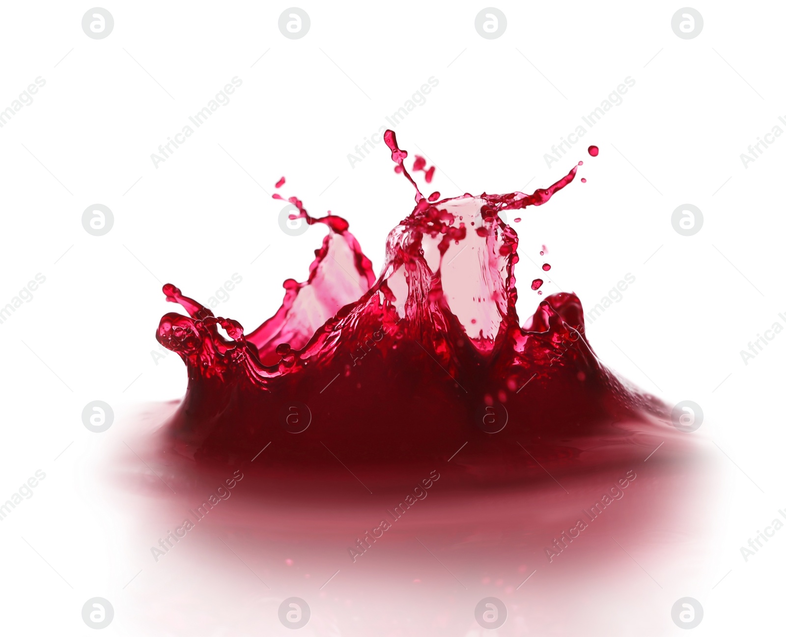 Photo of Splashing tasty fresh juice on white background