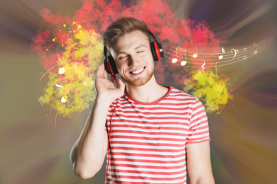 Handsome young man listening to music with headphones on color background. Bright notes illustration