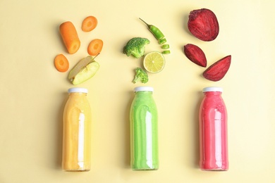 Photo of Flat lay composition with healthy detox smoothies and ingredients on light background