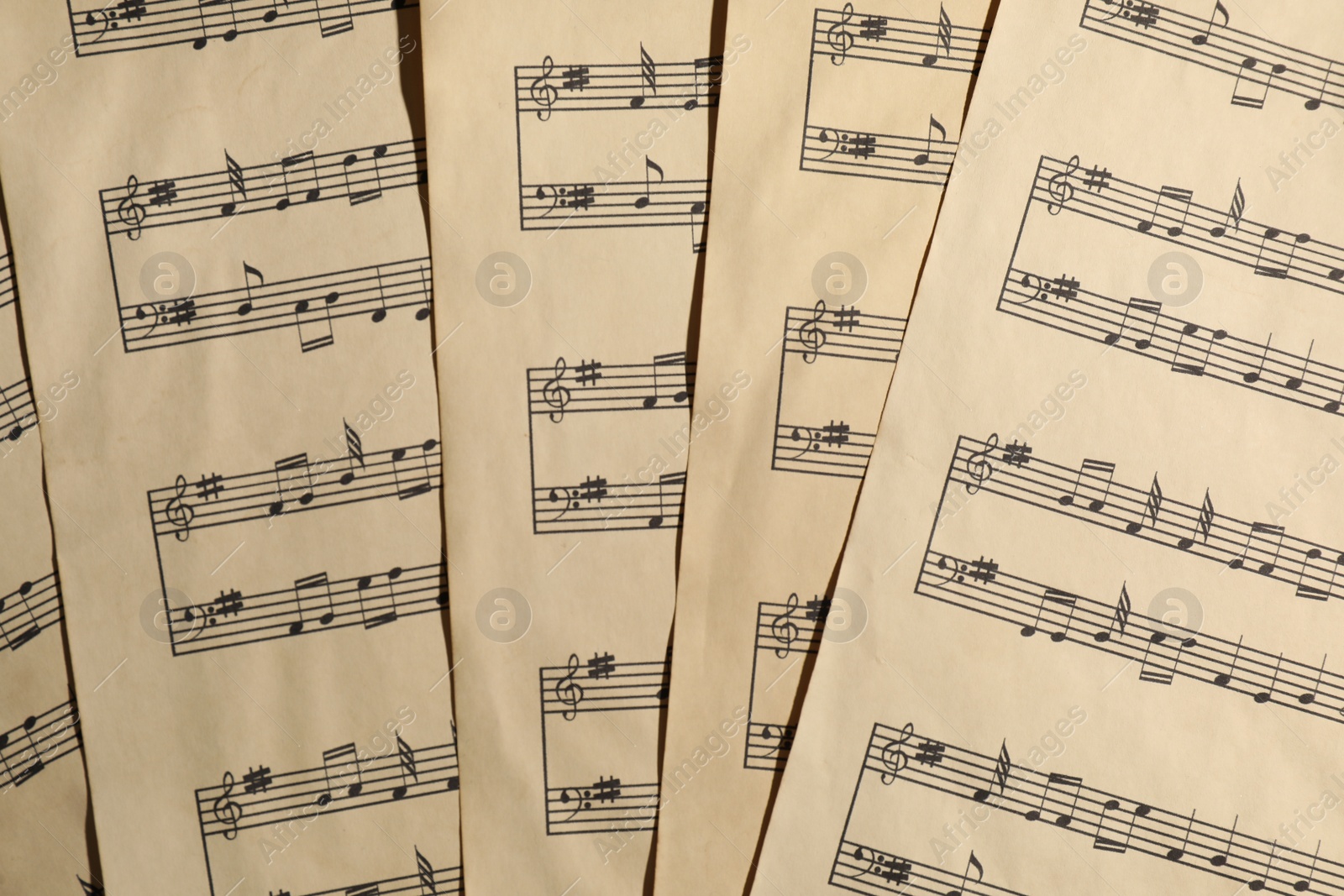 Photo of Many old note sheets as background, top view