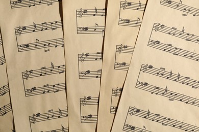 Photo of Many old note sheets as background, top view