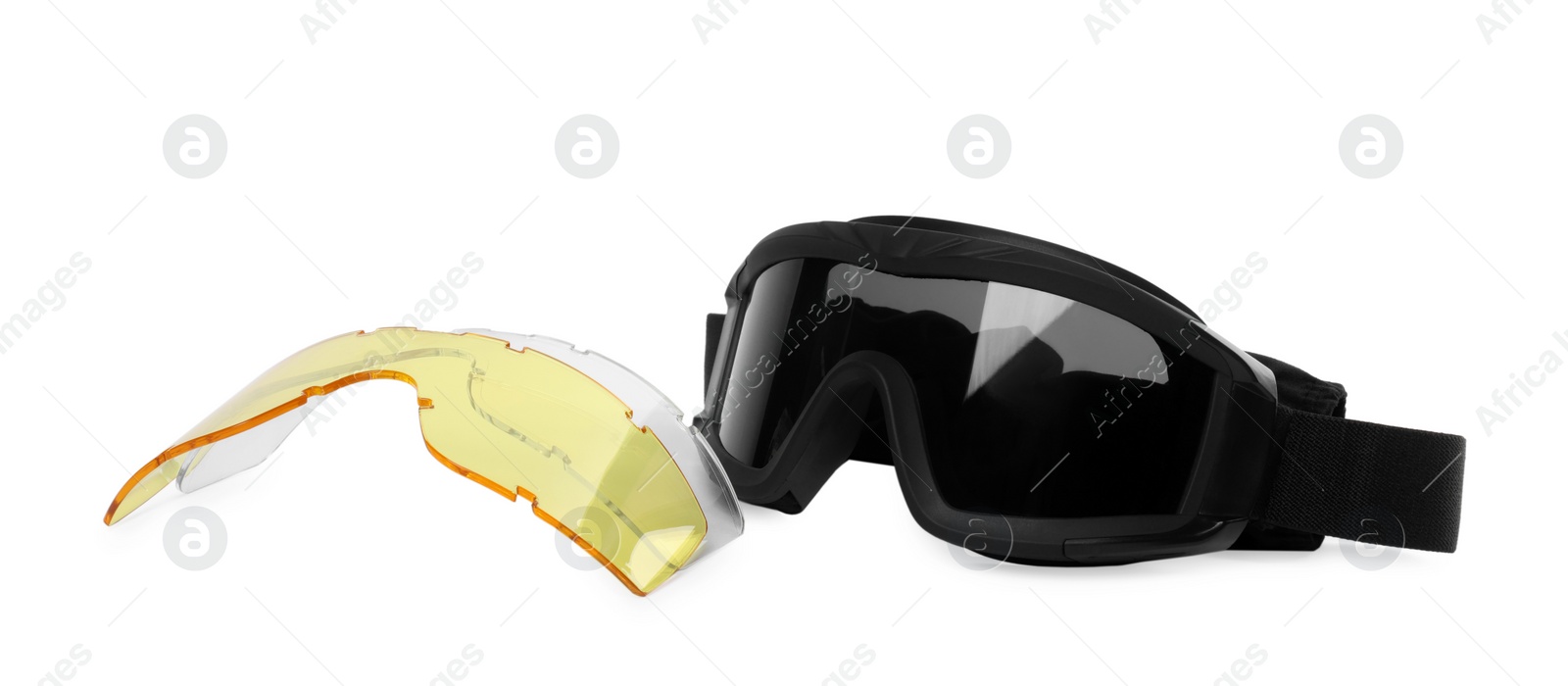 Photo of Tactical glasses and different lenses on white background. Military training equipment