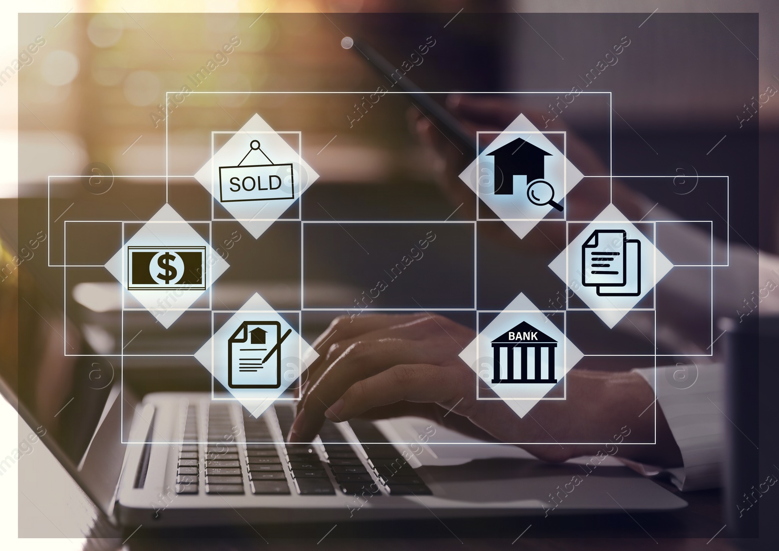 Image of Scheme with real estate icons against agent working on laptop