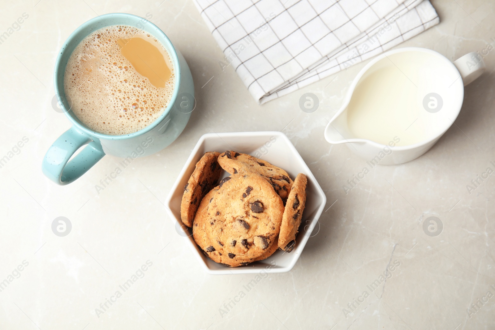 Photo of Flat lay composition with tasty chocolate chip cookies, coffee and milk on light background