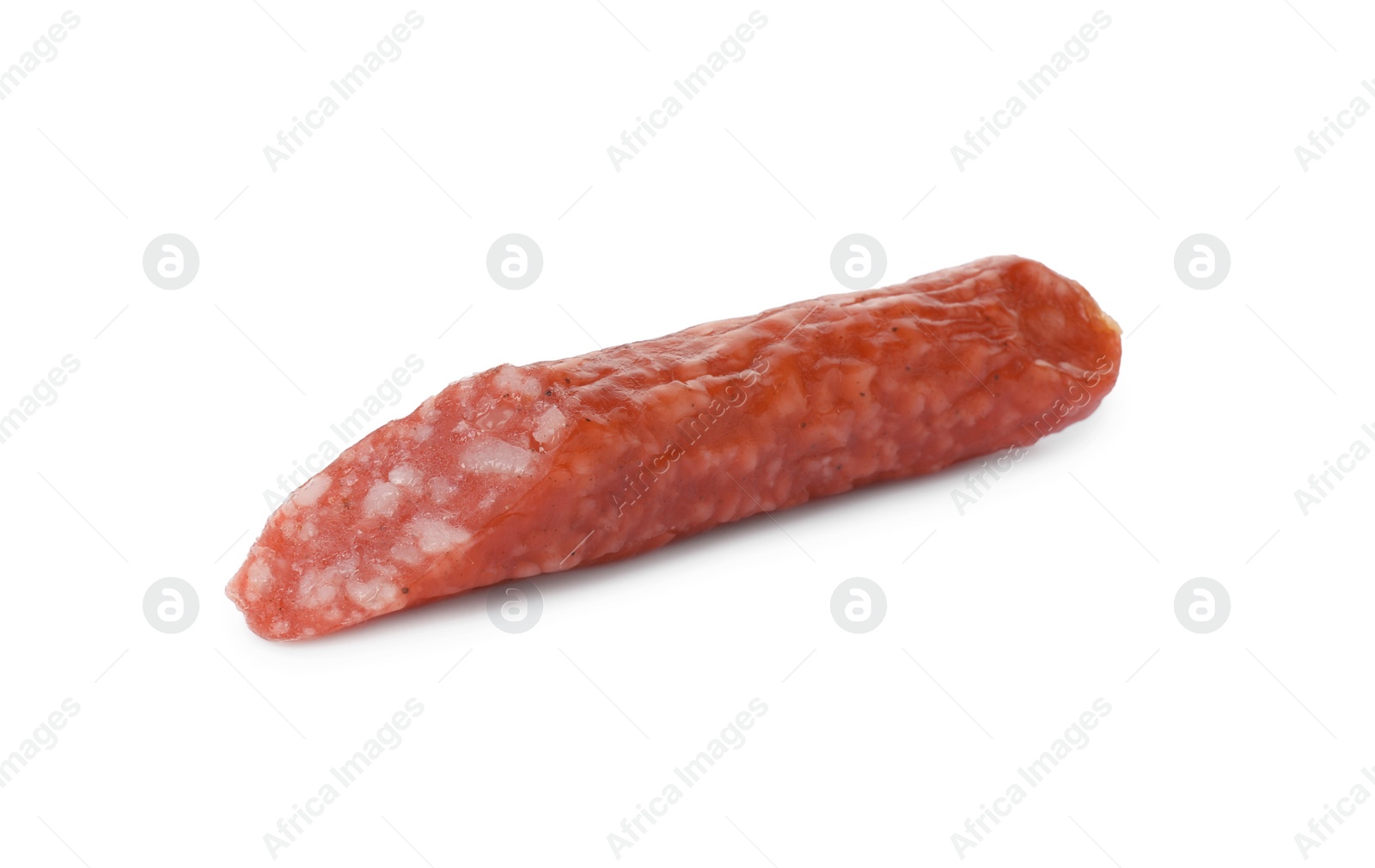 Photo of Piece of thin dry smoked sausage isolated on white