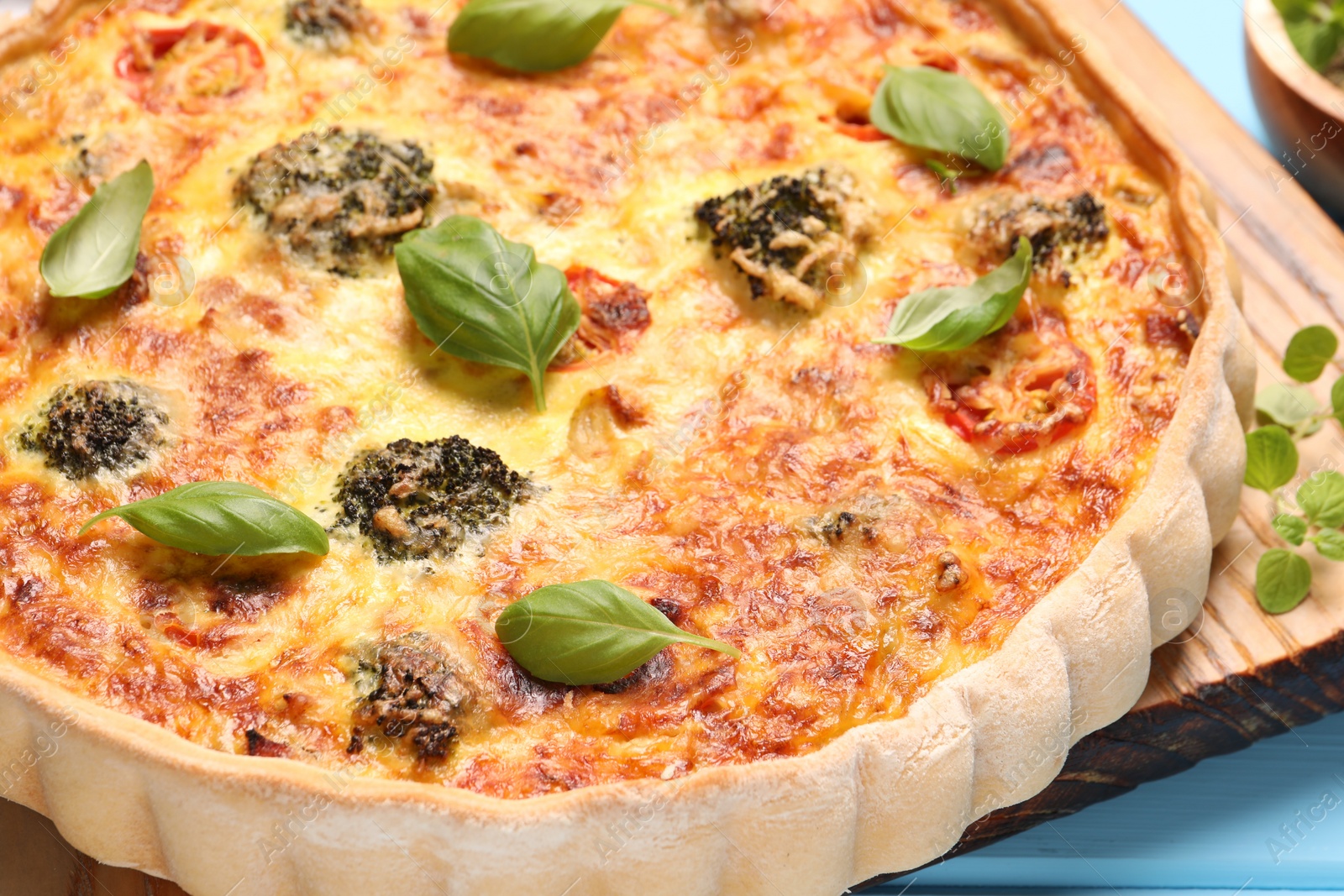 Photo of Delicious homemade vegetable quiche on table, closeup