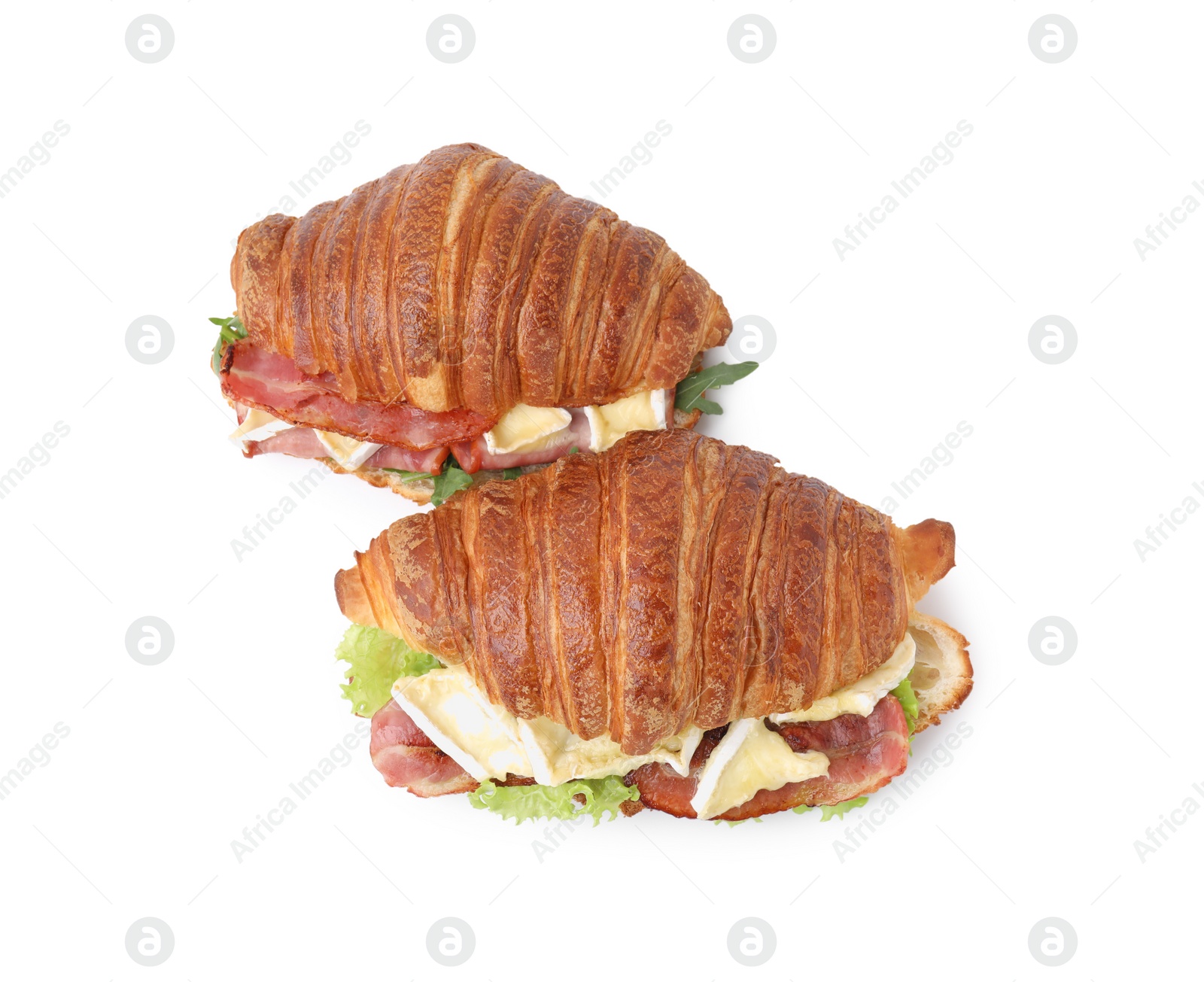 Photo of Tasty croissants with brie cheese, ham and bacon isolated on white