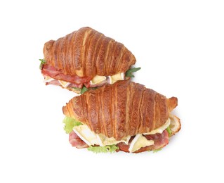 Photo of Tasty croissants with brie cheese, ham and bacon isolated on white