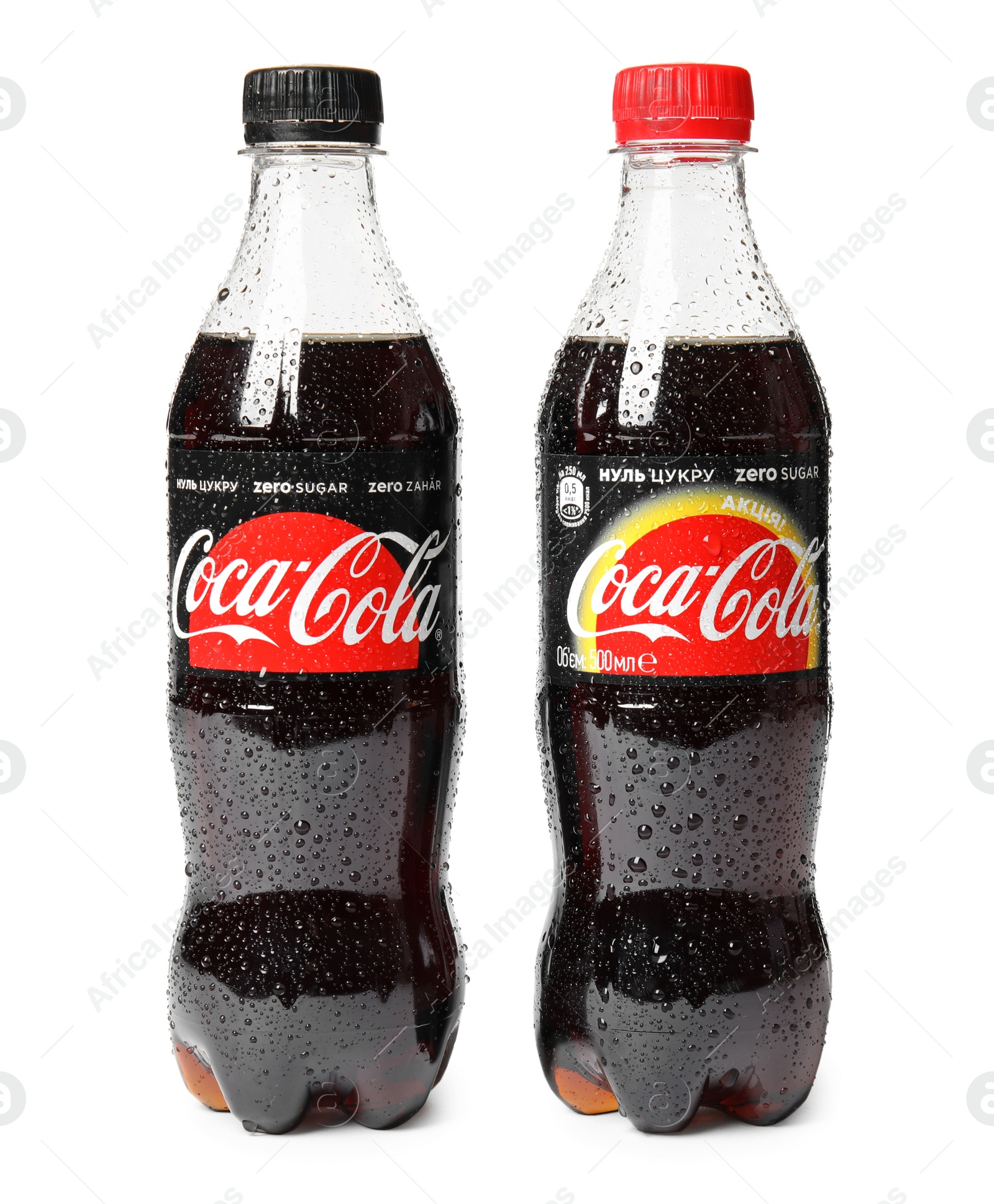 Photo of MYKOLAIV, UKRAINE - NOVEMBER 15, 2018: Bottles of Coca Cola on white background