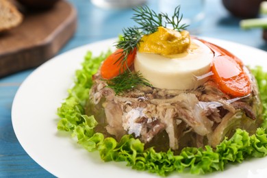 Delicious aspic with meat and vegetables on plate, closeup