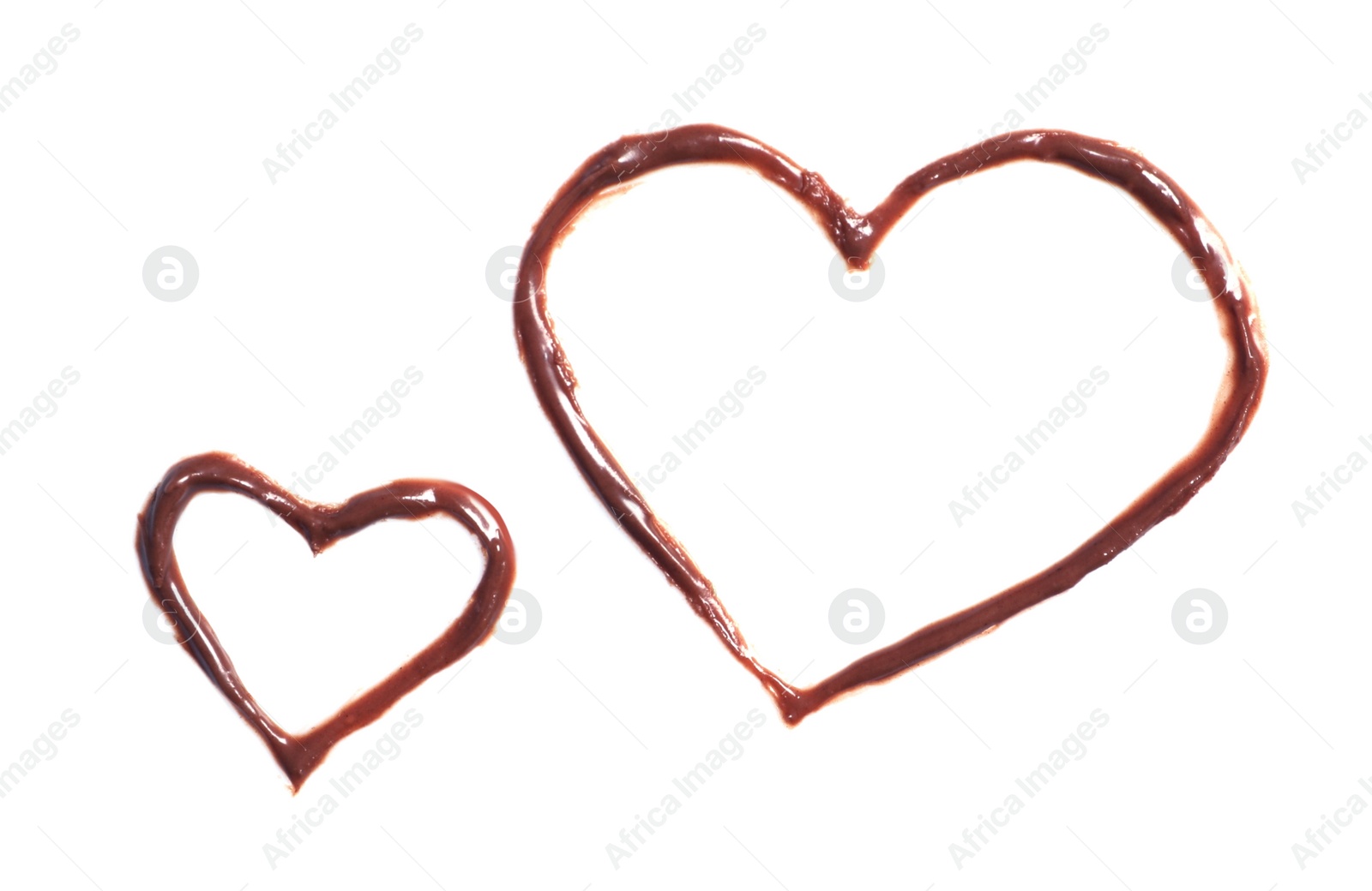 Photo of Hearts made of milk chocolate on white background, top view