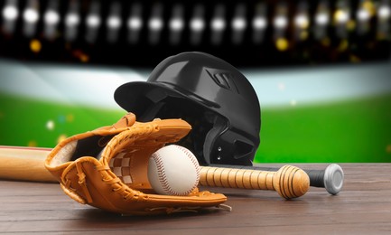 Image of Baseball bats, glove, helmet and ball on wooden table at stadium, banner design