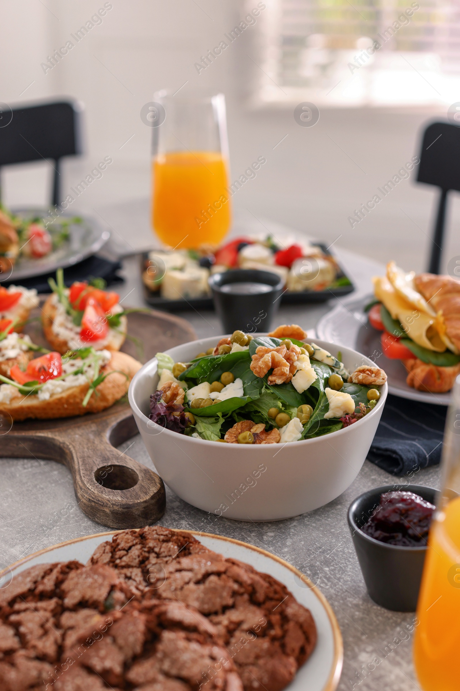 Photo of Many different dishes served on buffet table for brunch