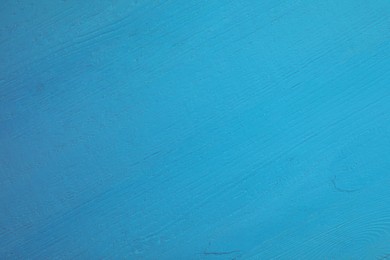 Photo of Texture of light blue wooden surface as background, closeup