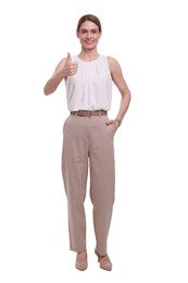 Photo of Beautiful happy businesswoman showing thumb up on white background