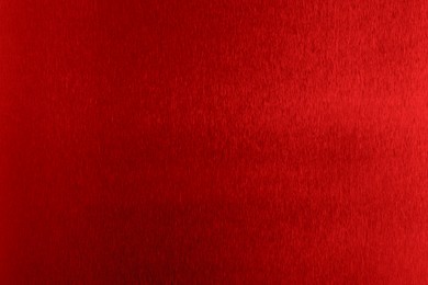 Image of Beautiful red foil as background, top view