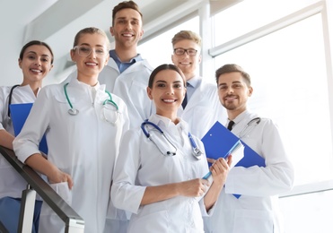 Photo of Group of medical doctors indoors. Unity concept