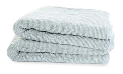 Photo of Soft folded terry towels isolated on white