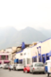 Photo of San Pedro Garza Garcia, Mexico – February 8, 2023: Blurred view of street with cars and beautiful buildings