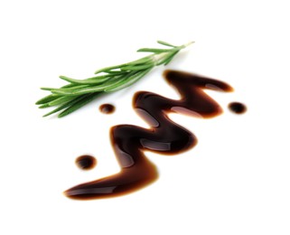 Photo of Balsamic glaze and rosemary on white background