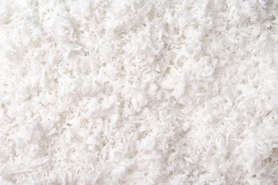 Photo of Fresh coconut flakes, closeup