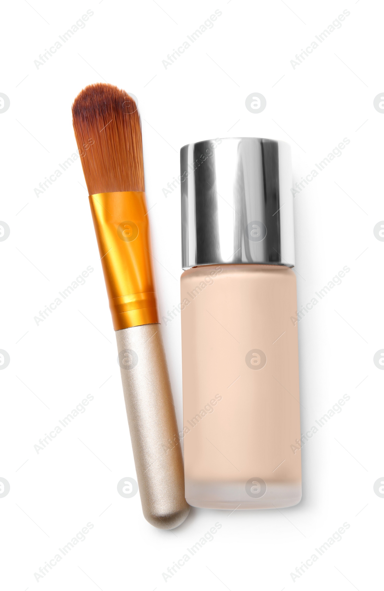 Photo of Foundation with makeup brush on white background