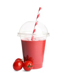 Photo of Plastic cup of tasty tomato smoothie and fresh vegetables on white background