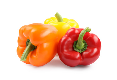 Photo of Fresh ripe bell peppers on white background