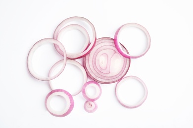 Photo of Fresh slices of red onion on white background