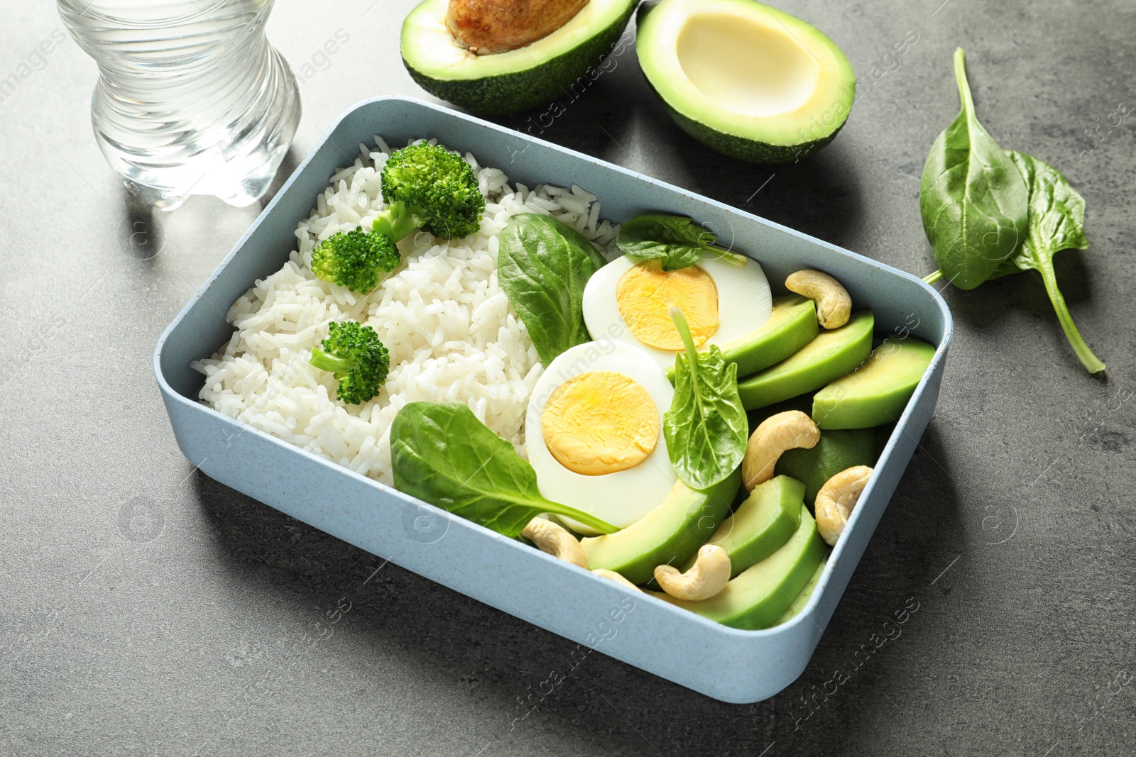 Container with natural healthy lunch on table. High protein food Photo of Container with natural healthy lunch on table. High protein food