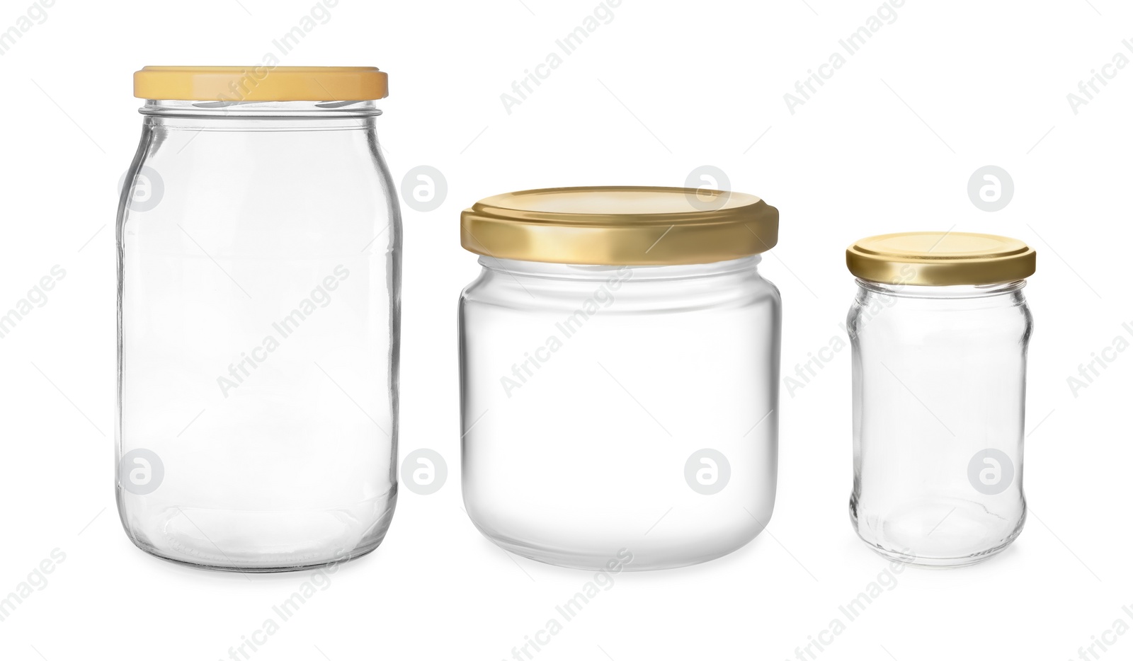 Image of Set with closed empty glass jars on white background